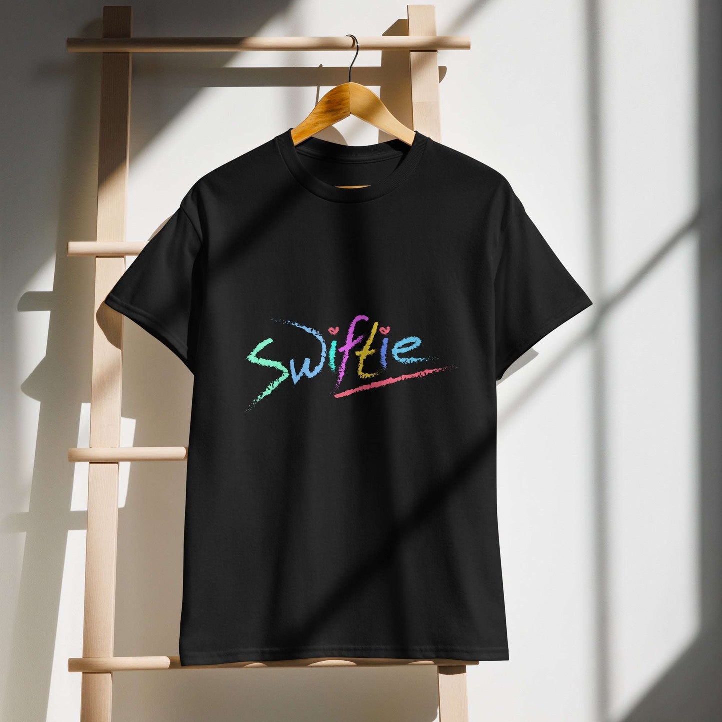 Show off your Swiftie spirit with the SWIFTIE Unisex T-Shirt! Soft, stylish, and perfect for any fan. Shop now at The Wishful Fish Kids!