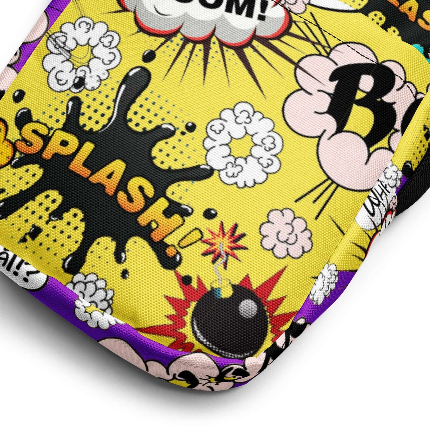Whether you're a teen looking to add some fun to your outfit or a mom who loves playful accessories, the Comic Cross Body Bag is the perfect way to carry your essentials in style.