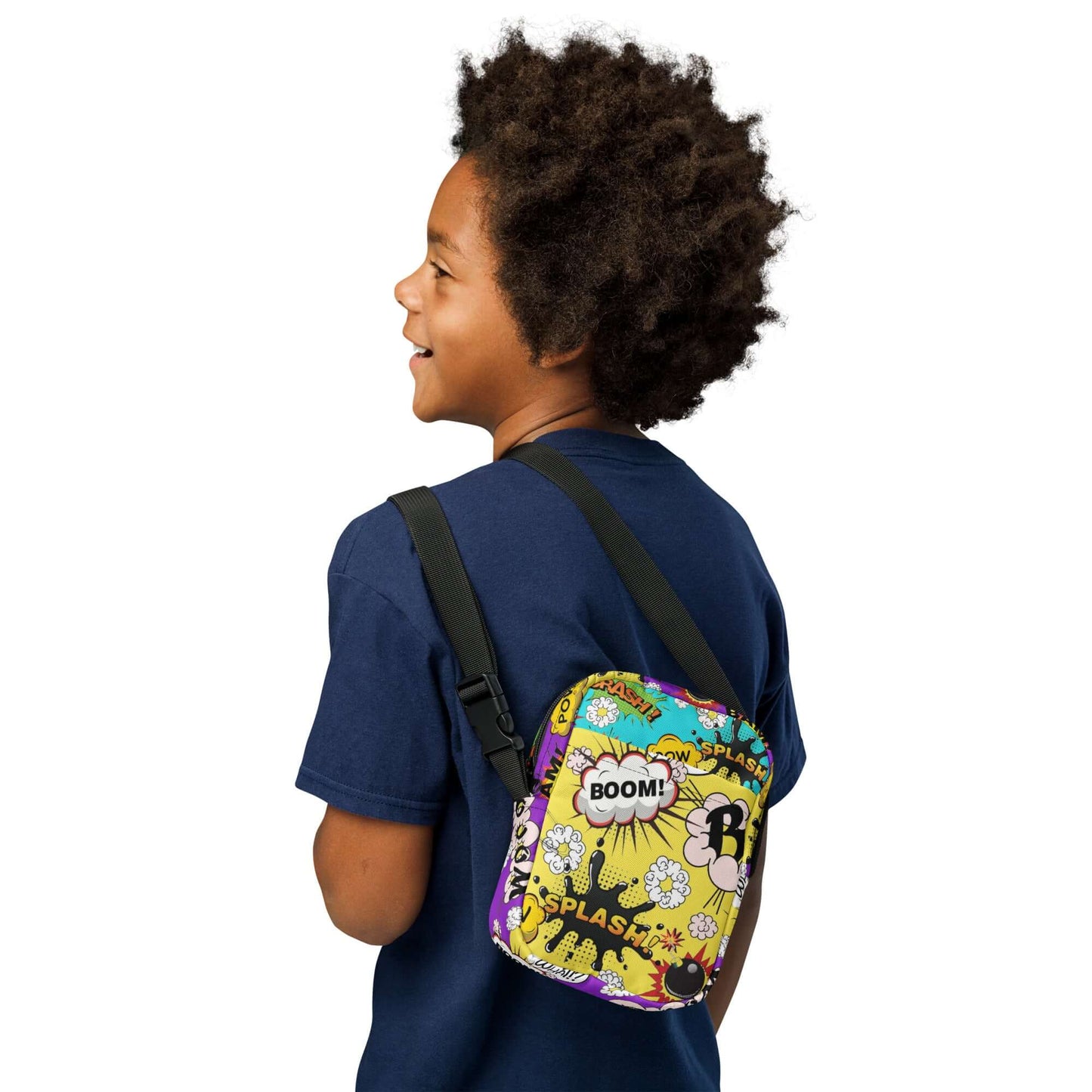Whether you're a teen looking to add some fun to your outfit or a mom who loves playful accessories, the Comic Cross Body Bag is the perfect way to carry your essentials in style.