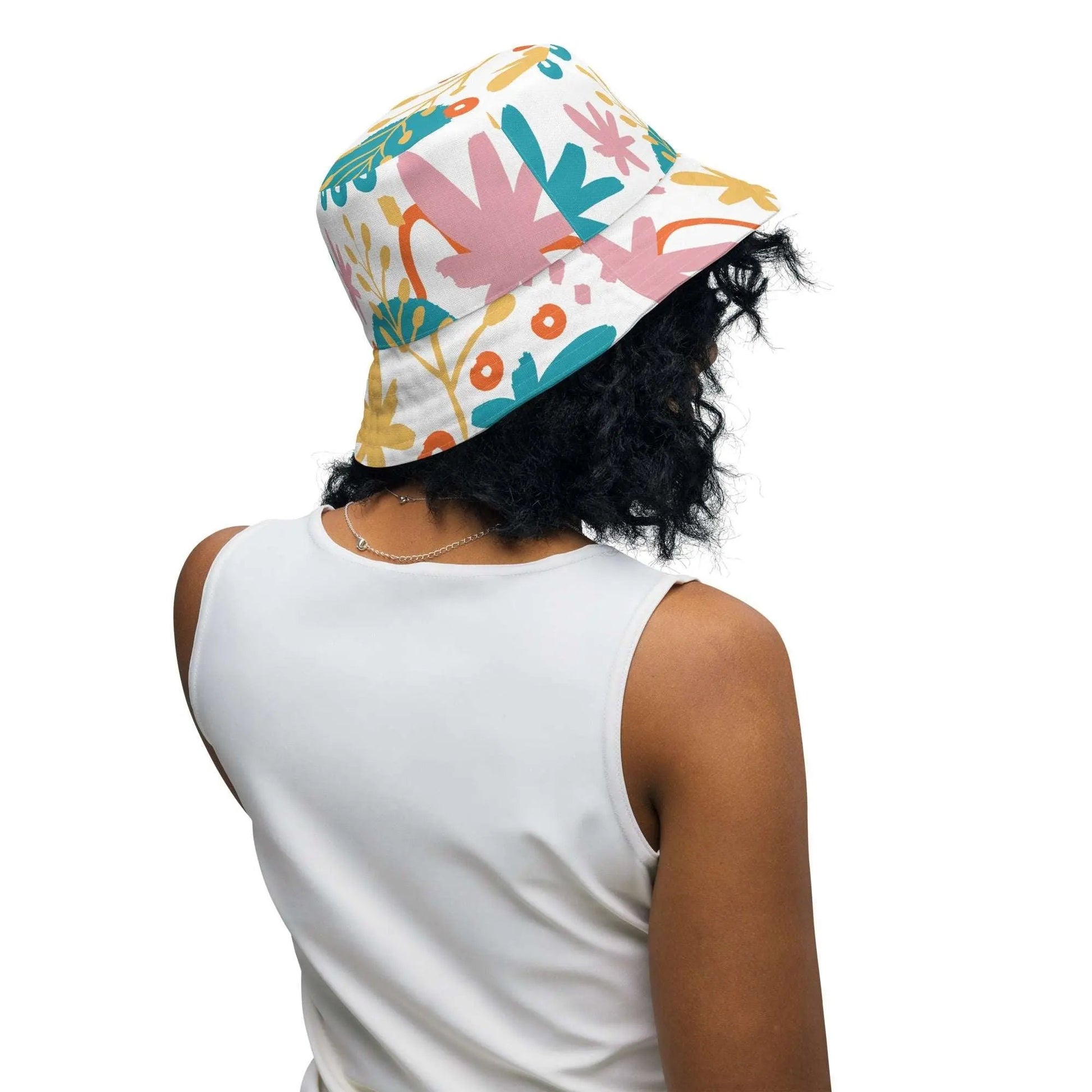 With its fun botanical print and trendy bucket hat style, it's the perfect accessory for any fashion-forward individual. Shop now at The Wishful Fish Kids