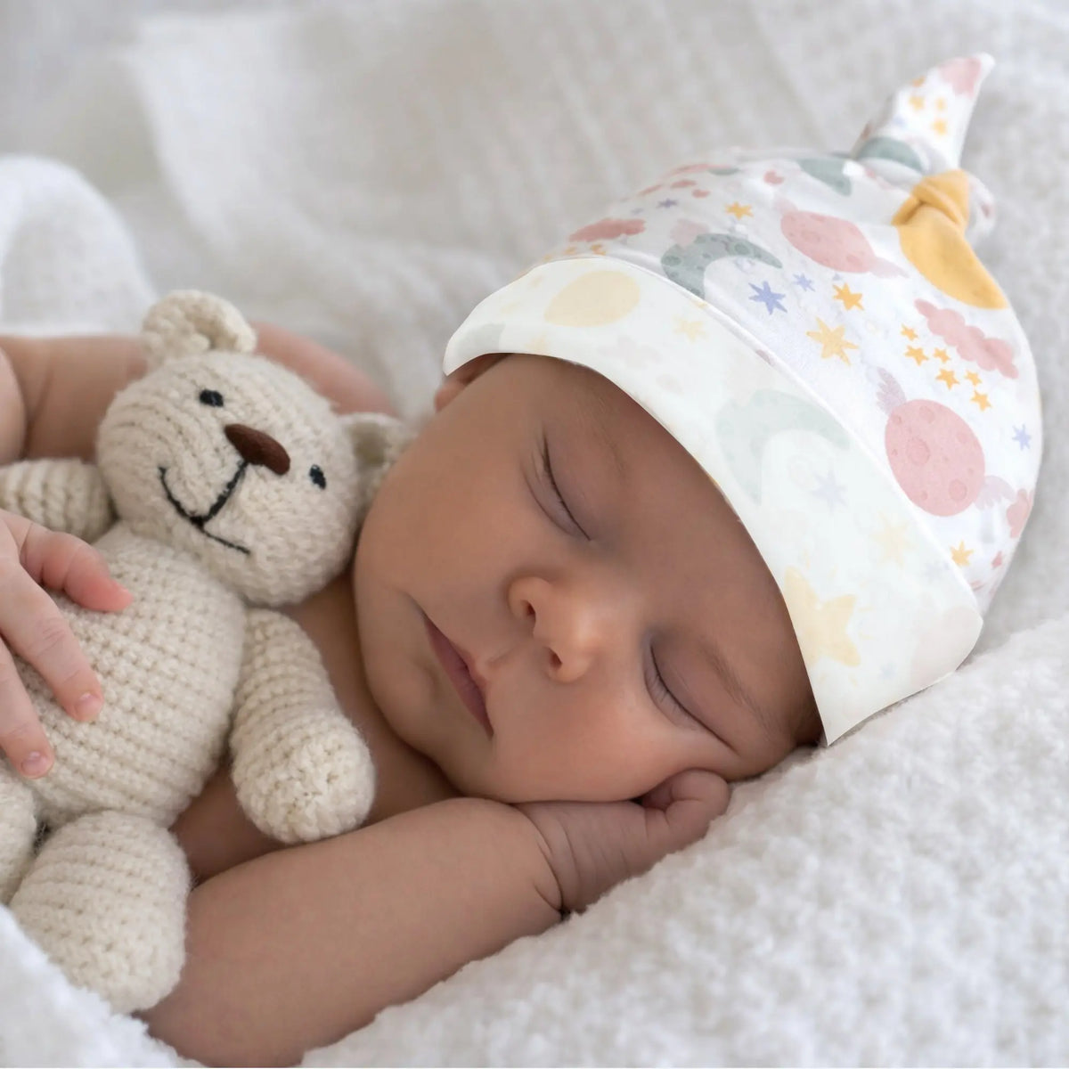 For a newborn features a charming vintage-inspired knot detail that adds a touch of whimsy. SHOP Now at The Wishful Fish KIDS