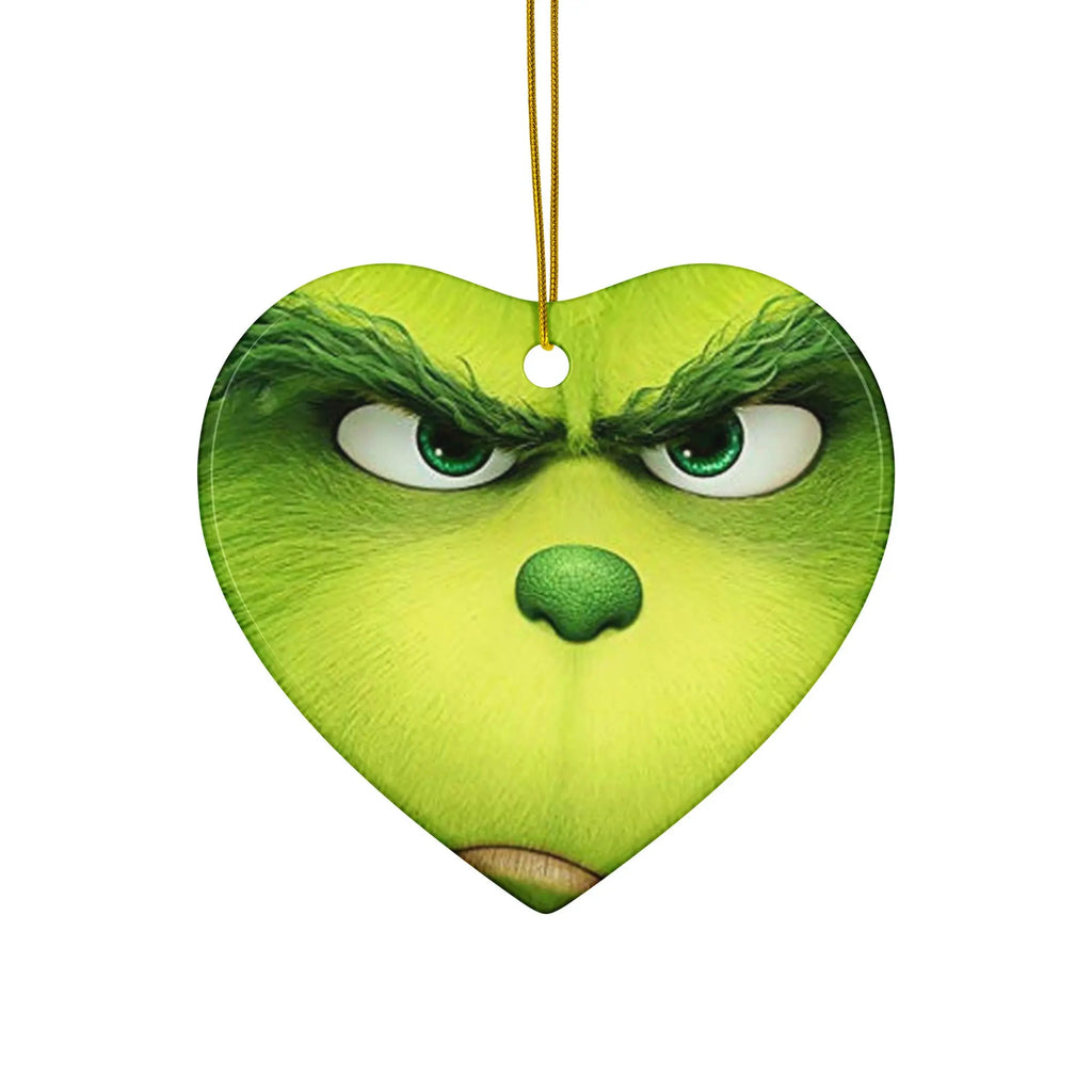 Grinch's iconic personality in festive style. SHOP Now at The Wishful Fish KIDS