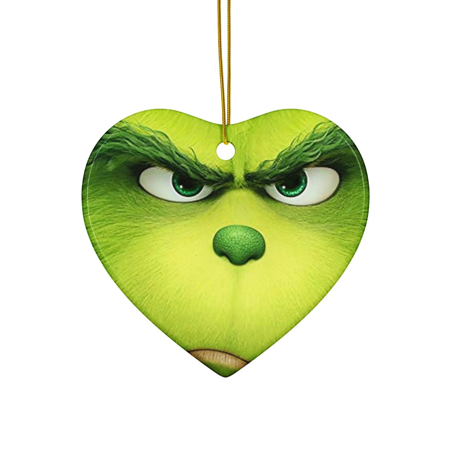 Grinch's iconic personality in festive style. SHOP Now at The Wishful Fish KIDS