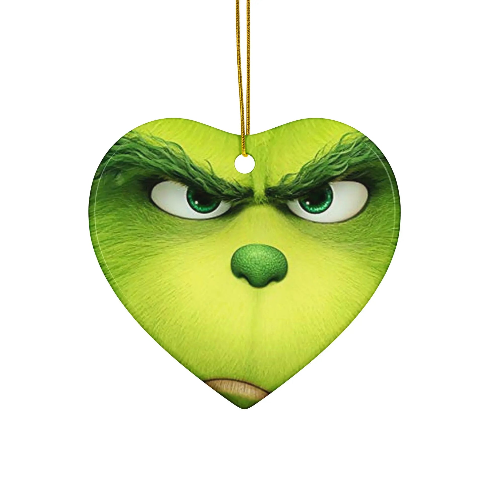 Grinch's iconic personality in festive style. SHOP Now at The Wishful Fish KIDS