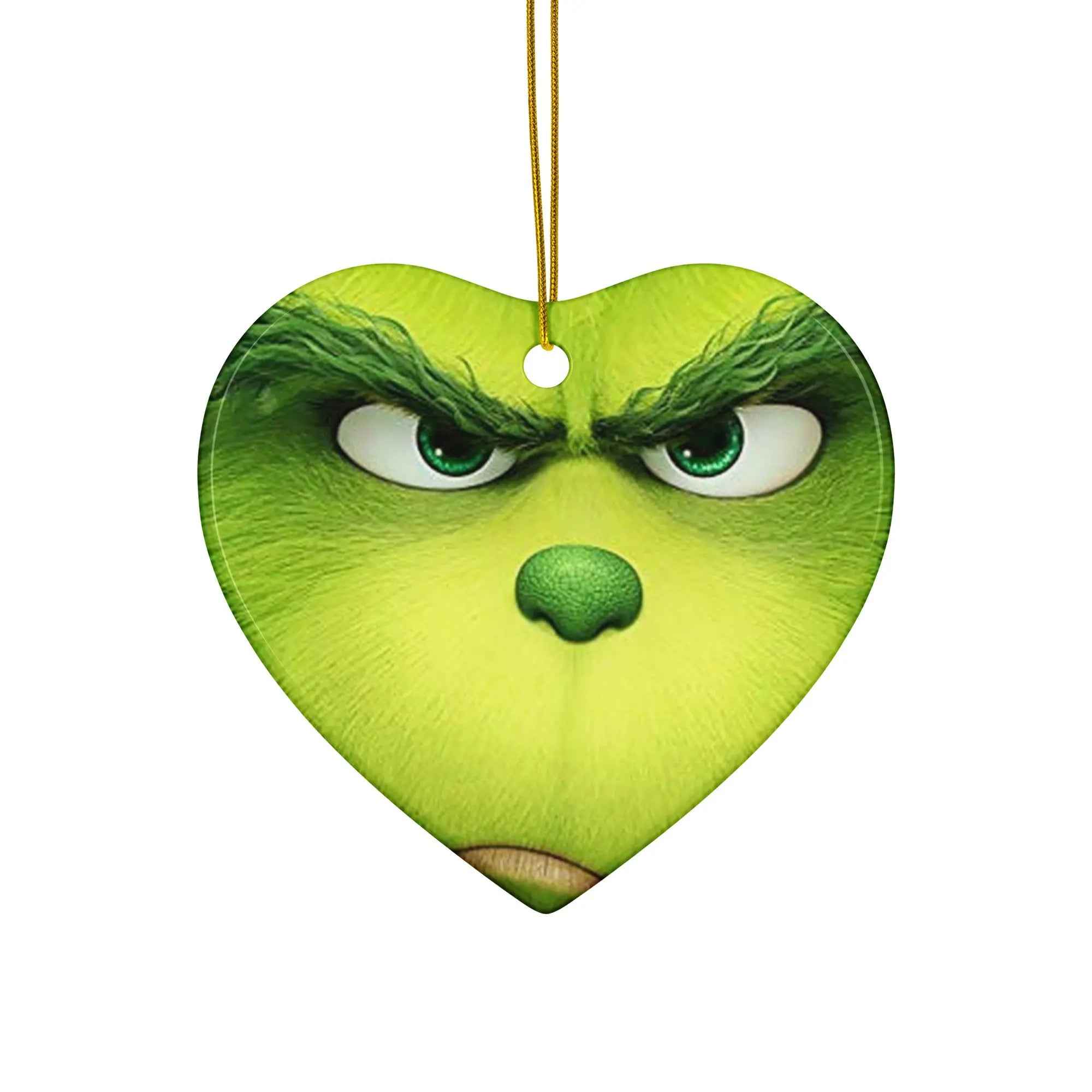 Grinch's iconic personality in festive style. SHOP Now at The Wishful Fish KIDS
