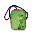 Carry your mischievous side with this bold Grinch Cross Body Bag . SHOP Now at The Wishful Fish KIDS