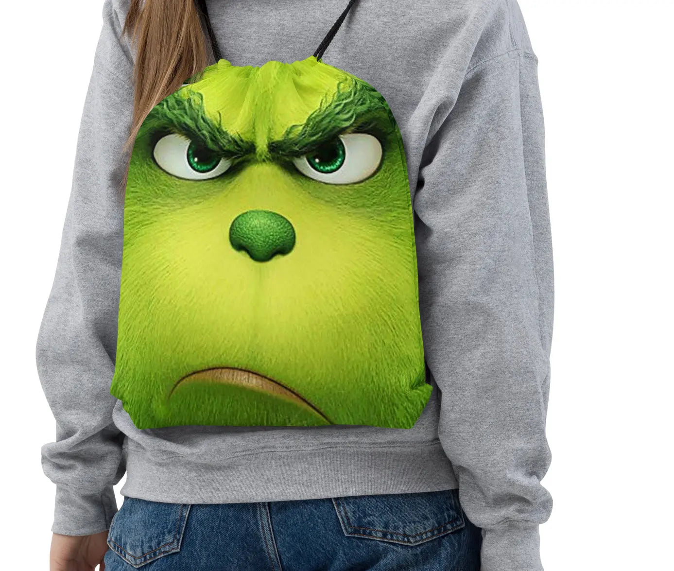 Grinchy Adventures Start Here with the GRINCH FACE Drawstring Bag. SHOP Now at The Wishful Fish KIDS