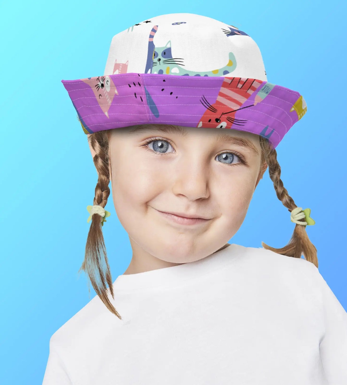 The KITTY CAT Reversible Bucket Hat brings double the fun. SHOP Now at The Wishful Fish KIDS