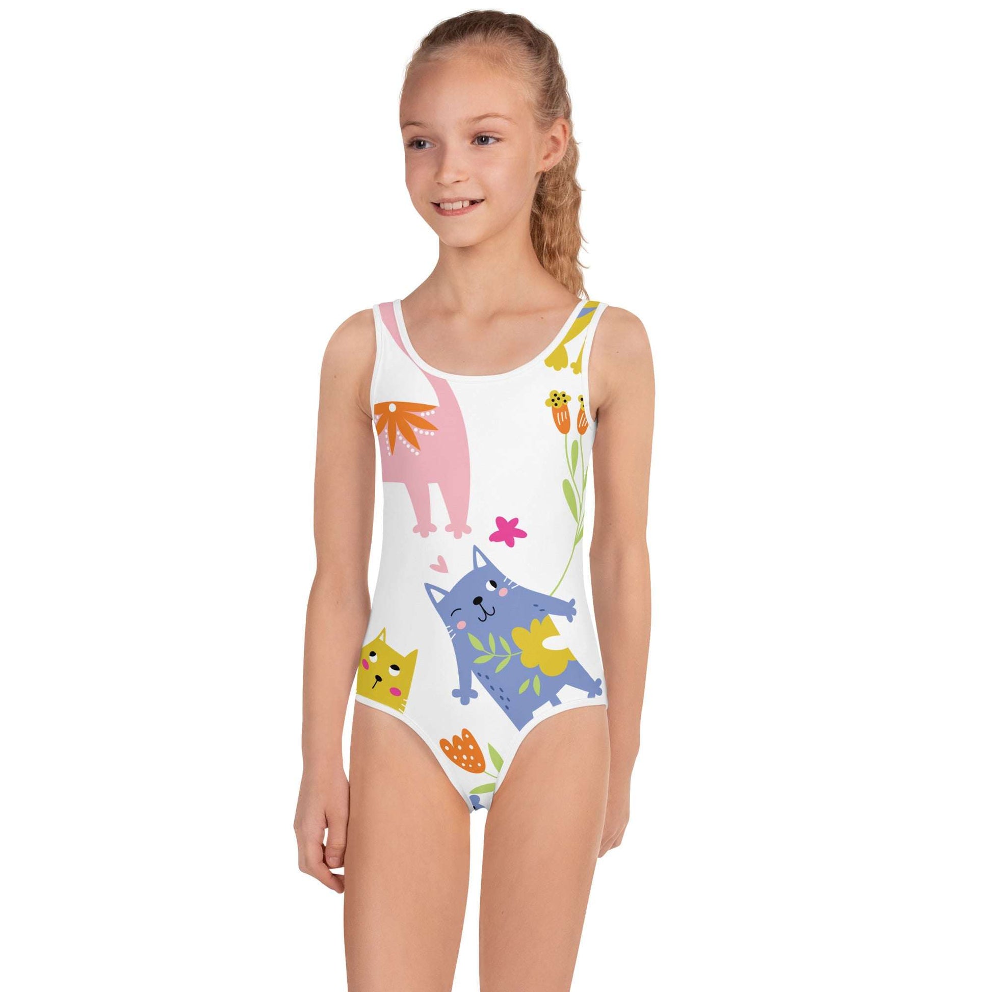 SHOP PLAYFUL KITTIES Swimsuit at The Wishful Fish KIDS. Our colorful kids wear makes fun gifts for all ages featuring a cute kitty print. Perfect presents.