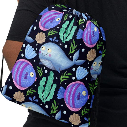 SHOP SEA CREATURES Drawstring Bag at The Wishful Fish KIDS. Featuring a playful design, this colorful gear is perfect for kids, teens, or anyone who loves to stand out. 