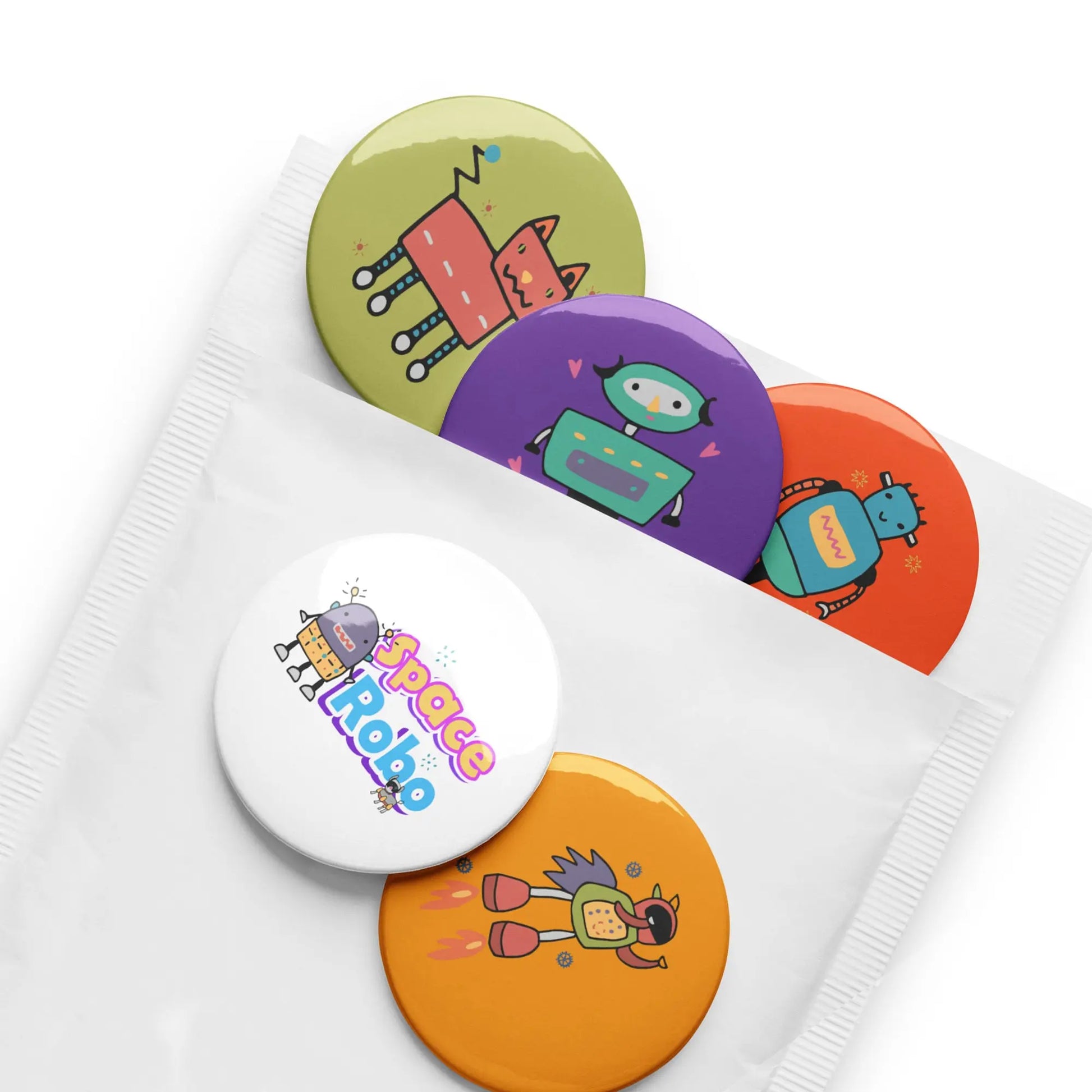 Blast off with these out-of-this-world SPACE ROBOTS Pin Back Buttons. SHOP Now at The Wishful Fish KIDS