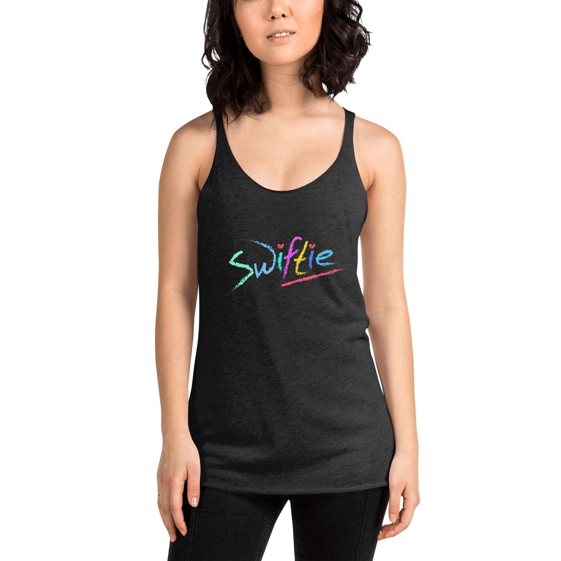 Stay stylish with The SWIFTIE Racerback Tank Top from The Wishful Fish KIDS! Perfect for Taylor Swift fans who love comfort and style. Shop now!