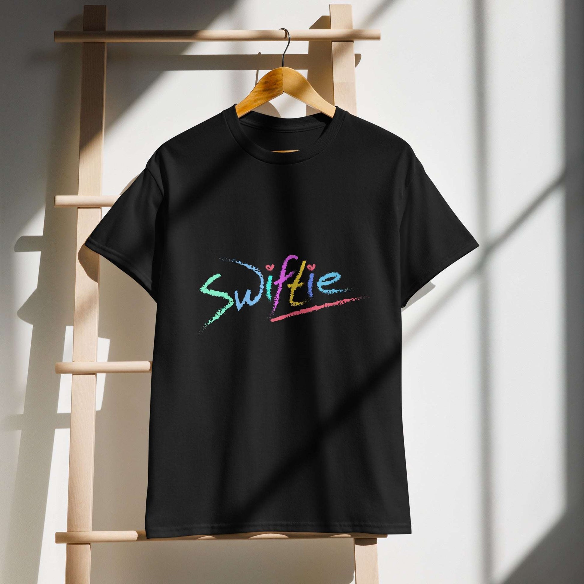 Show off your Swiftie spirit with the SWIFTIE Unisex T-Shirt! Soft, stylish, and perfect for any fan. Shop now at The Wishful Fish Kids!