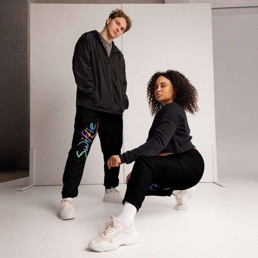 Stay stylish in The SWIFTIE Unisex Track Pants from The Wishful Fish Kids! Perfect for every Taylor Swift fan. Shop now and show your Swiftie pride!