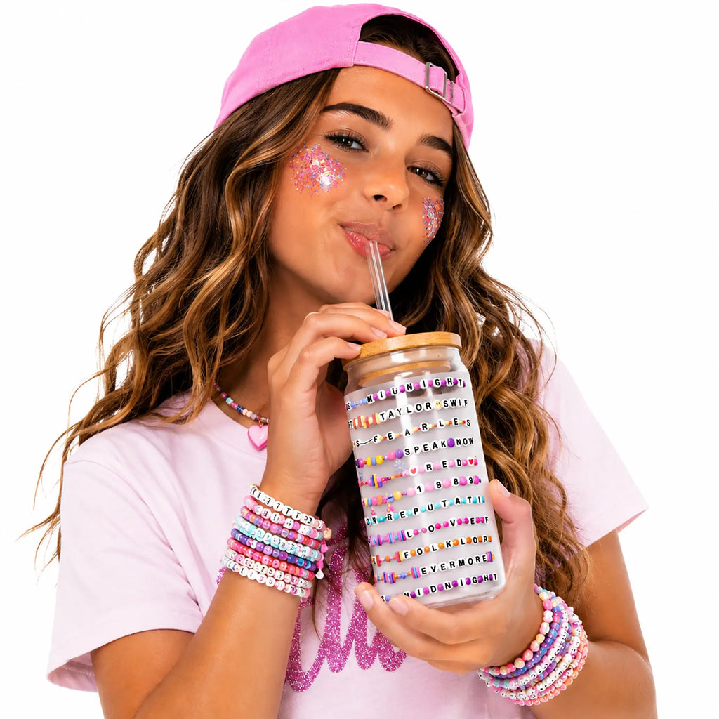 Bring every sip into your favorite era with this colorful Swiftie fan glass can. SHOP Now at The Wishful Fish Kids