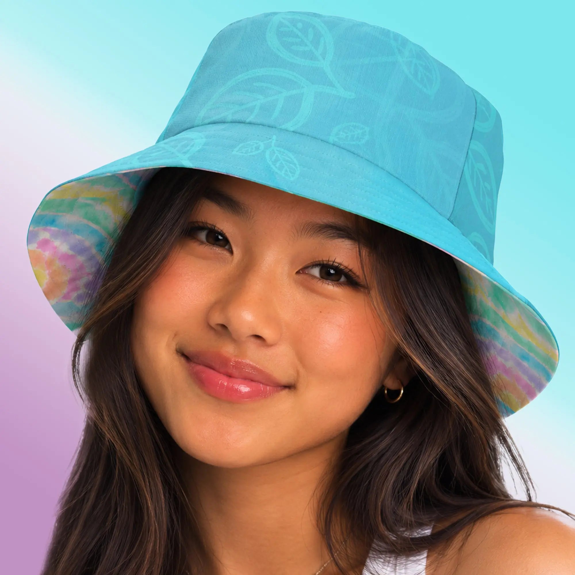 A Reversible Tie Dye Bucket Hat Bursting with Tie Dye Fun.  SHOP Now at The Wishful Fish Kids