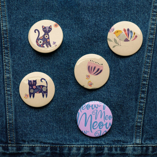 With a playful design and cool vibes, these pin back buttons are made for cat lovers. SHOP Now at The Wishful Fish KIDS 