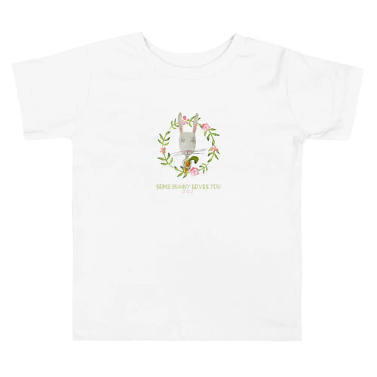 Hop into cuteness with this adorable SOME BUNNY LOVES YOU Toddler Tee. SHOP Now at The Wishful Fish Kids